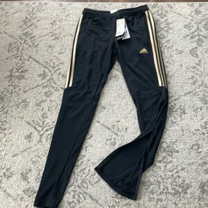 Black and gold Adidas Zipper pants